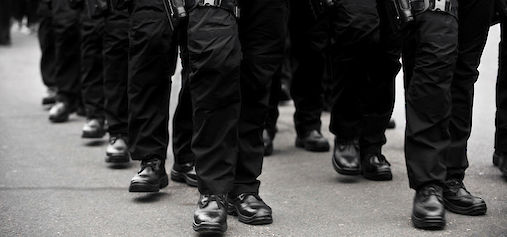 Booted feet marching in formation