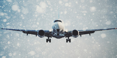 Plane Landing in Snow