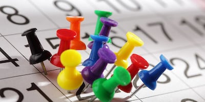 Pushpins Selecting One Date in Calendar